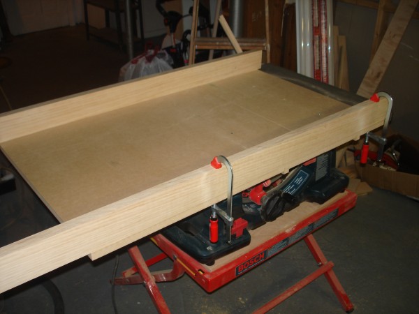 Clamping on back fence