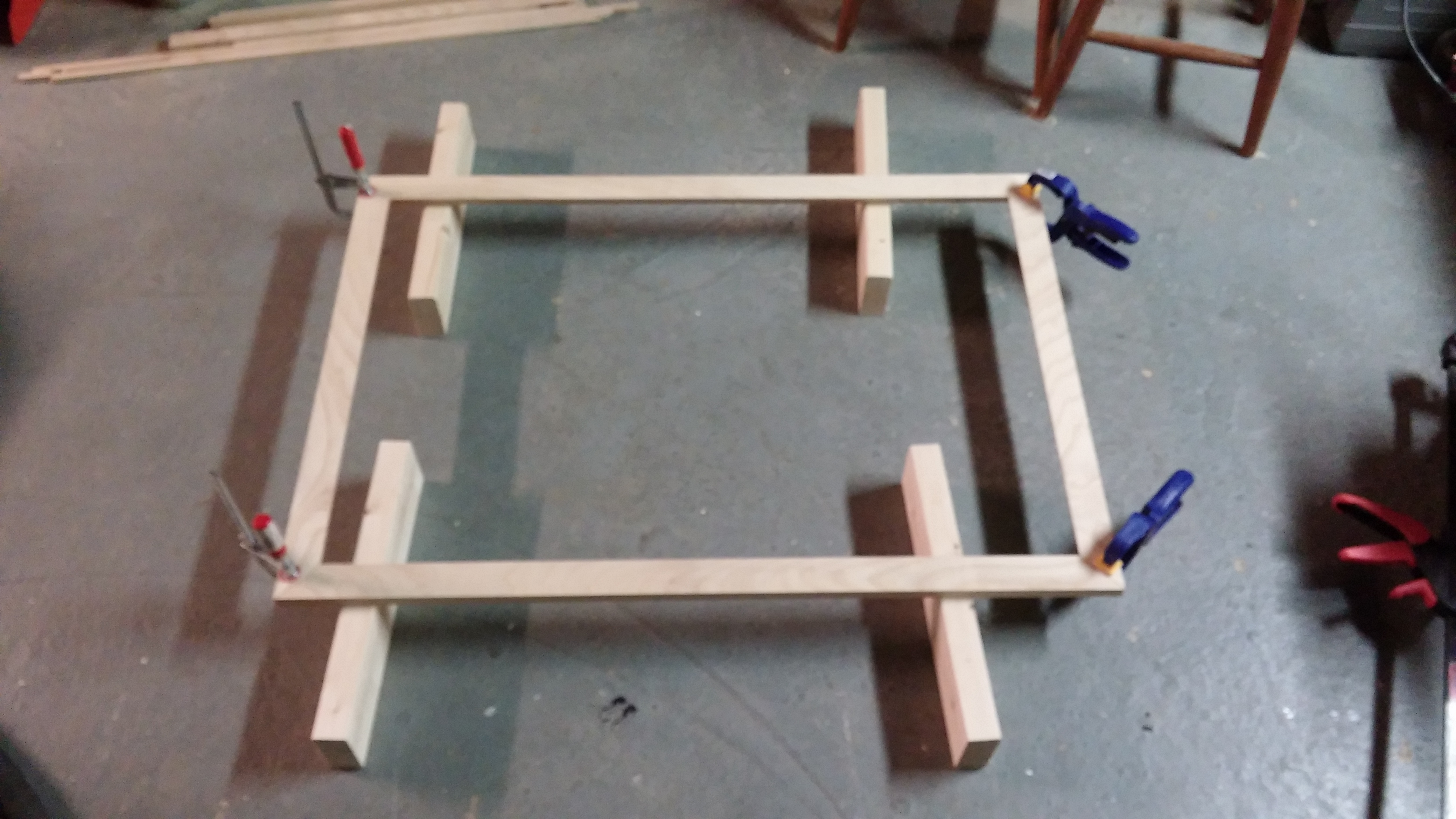 Gluing everything together.  The mitered half-laps did a good job of keeping everything square