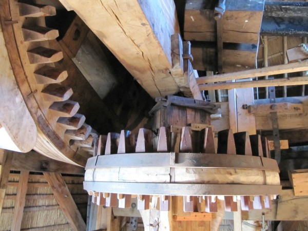 The transmission from the brake wheel to the main shaft is with 2:1 quite low for a windmill. This is needed because of the enormous mass of the machinery that has to be kept in motion.